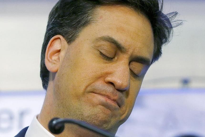 Britain's Labour Party leader Ed Miliband reacting to the results of the count of his seat in Doncaster, northern England, on May 8, 2015. -- PHOTO: REUTERS