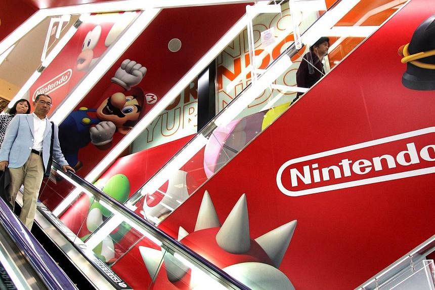 An advertisement of Japanese video game giant Nintendo at an electronic shop in Tokyo on May 7, 2015. -- PHOTO: AFP&nbsp;
