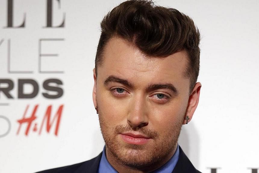 British singer Sam Smith, seen here at the Elle Style Awards 2015 in London, said on Thursday he would undergo surgery on his vocal cords and cancelled weeks of shows. -- PHOTO: AFP &nbsp;