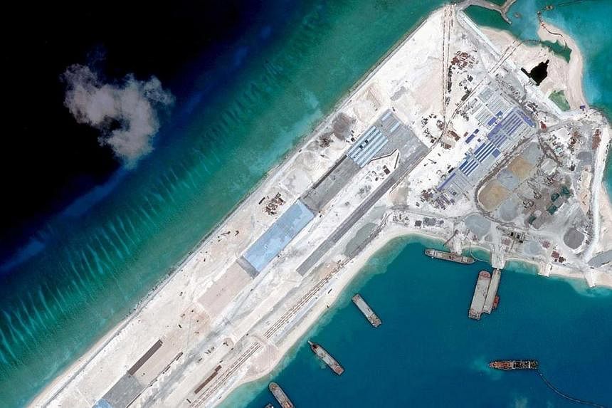 Airstrip construction on the Fiery Cross Reef in the South China Sea is pictured in this April 2, 2015, handout satellite image obtained by Reuters on April 16, 2015. -- PHOTO: REUTERS&nbsp;