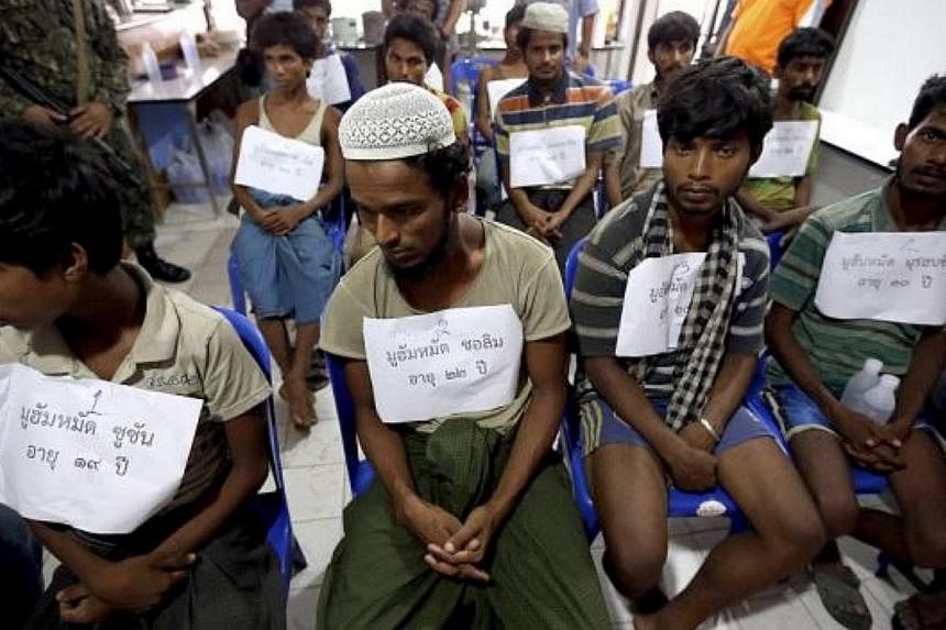 Suspected ethnic Rohingya migrants, who were rescued by Thai officials from a jungle, being detained in Songkhla province. -- PHOTO: THE STAR/ ASIA NEWS NETWORK&nbsp;