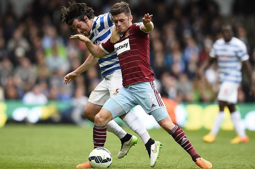 QPR's Joey Barton in action with West Ham's Aaron Cresswell, in their match on April 25, 2015.West Ham United are on course for a place in next season's Europa League after Uefa said on Friday that the Premier League would be granted an additional fa