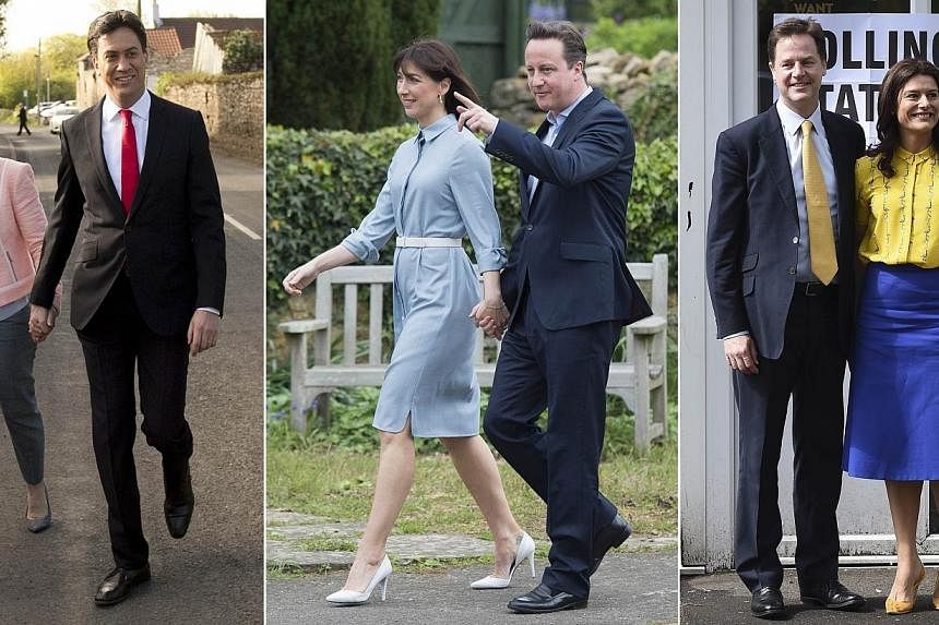Left to right: Opposition Labour Party leader Ed Miliband and his wife Justine Thornton, leader of the Conservative Party David Cameron and his wife Samantha and leader of the Liberal Democrat party Nick Clegg and his wife Miriam Gonzalez Durantez vo