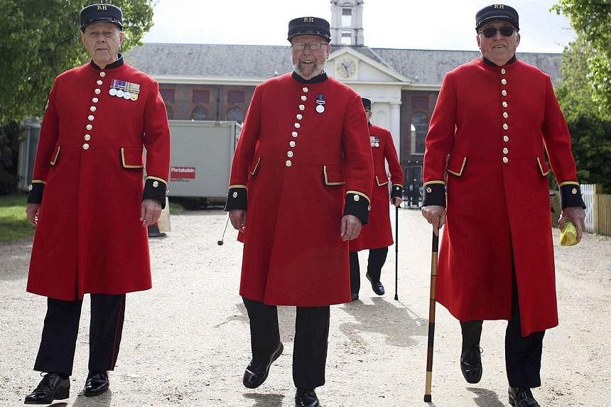 Chelsea Pensioners walking to cast their vote in the general election in London on May 7, 2015. -- PHOTO: REUTERS