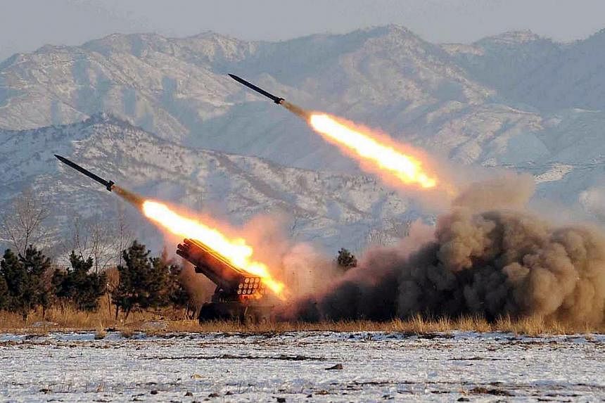 An undated photo released by the Korean Central News Agency (KCNA) on January 5, 2009, shows a missile-firing drill at an undisclosed location in North Korea. North Korea has test-fired a newly developed underwater ballistic missile, KCNA reported ea