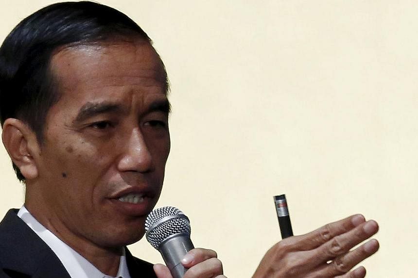 Indonesian President Joko Widodo speaking during the Indonesia business forum in Tokyo on March 24, 2015. Mr Widodo was expected to announce the release of several political prisoners in the restive eastern province of Papua on Saturday, seeking to r
