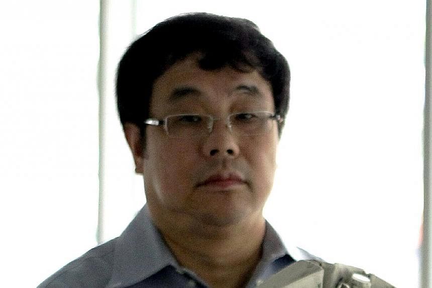Li Huabo, a former financial official in the central province of Jiangxi who is suspected of embezzling 94 million yuan (S$20.13 million), fled China in 2011, the official Xinhua news agency said. -- PHOTO: ST FILE