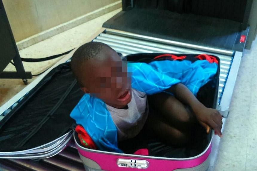 An eight-year-old boy who was found hidden in a woman's suitcase.&nbsp;Police found an eight-year-old Ivorian boy hidden in a&nbsp;suitcase that was smuggled across the border into Spanish territory in north Africa, an official said on Friday.&nbsp;-