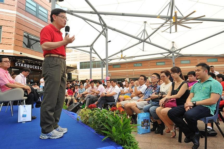 Education Minister Heng Swee Keat at a dialogue session at the Bishan Community Club. He explains the considerations behind his ministry's recent announcement of a delay to a new but yet-to-be-named junior college at the junction of Sin Ming Avenue a