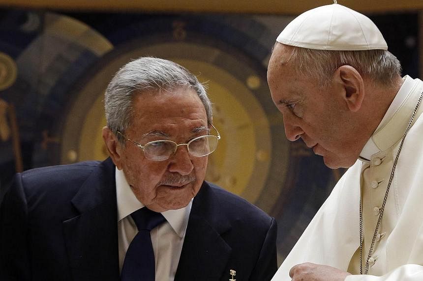 Pope Francis (right) talks with Cuban President Raul Castro during a private audience at the Vatican on May 10, 2015. Pope Francis, who helped broker a historic thaw between the United States and Cuba, held talks with Castro on Sunday ahead of the po