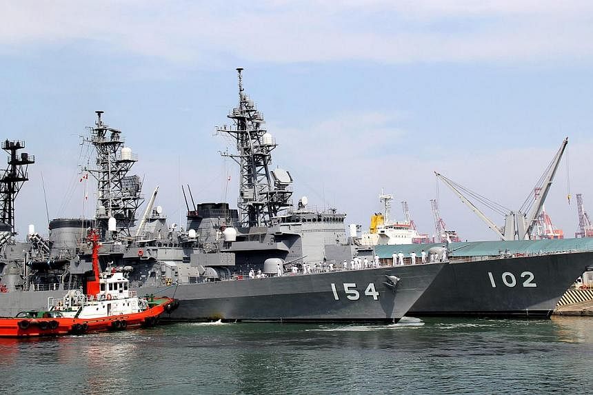 A handout picture released by the Philippine Navy Public Affairs Office shows the Japanese destroyers Harusame (back) and Amigiri (front) docking at Manila South harbour, Philippines on May 9,&nbsp;2015. The Philippines' navy chief said on Sunday, Ma