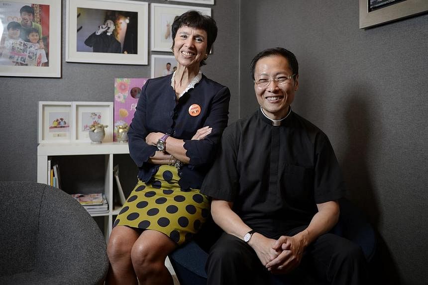 Father Luke Fong (right), who got a stem cell transplant from a donor in Chicago, with Bone Marrow Donor Programme chief executive Jane Prior.