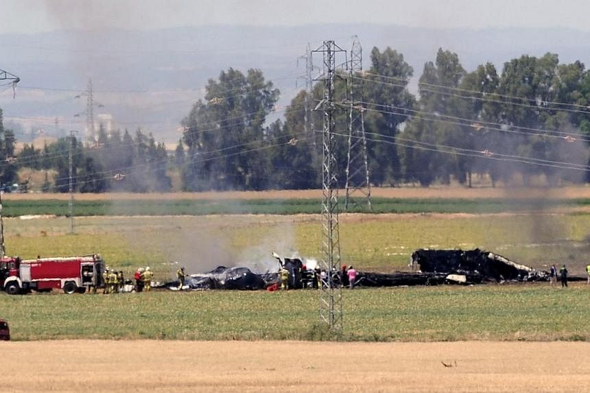 A view shows the wreckage of an Airbus A400M military transport plane after it crashed near Sevilla on May 9, 2015.&nbsp;Germany has grounded its Airbus A400M military transport aircraft after a similar plane crashed in Spain during a test flight on 