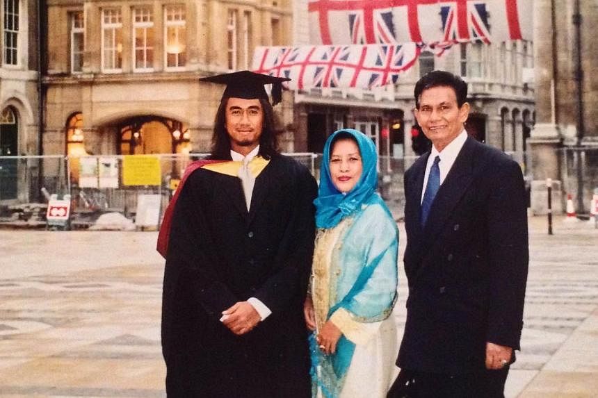 Art with his parents after graduating with a diploma in professional music development in London in 2003. -- PHOTO: COURTESY OF ART FAZIL