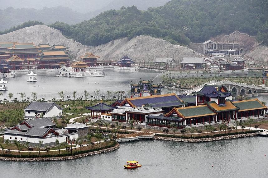 A general view of scenic areas which are part of a replica of Beijing's Old Summer Palace or Yuanmingyuan, built in Hengdian town of Zhejiang province, eastern China on May 10, 2015. -- PHOTO: EPA