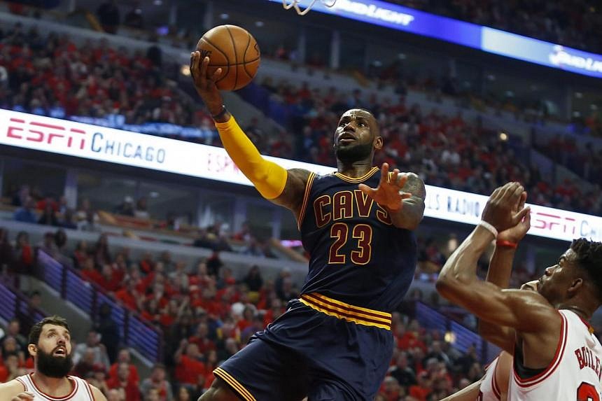 Basketball: LeBron James nails buzzer beater to tie Cleveland-Bulls ...