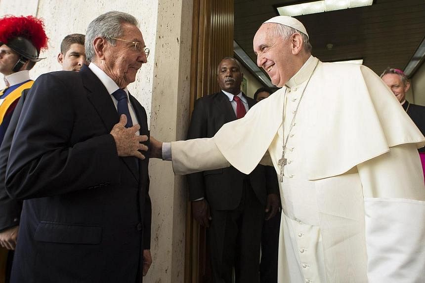 Pope Francis meets Cuban President Raul Castro during a private audience at the Vatican, on May 10, 2015. -- PHOTO: EPA