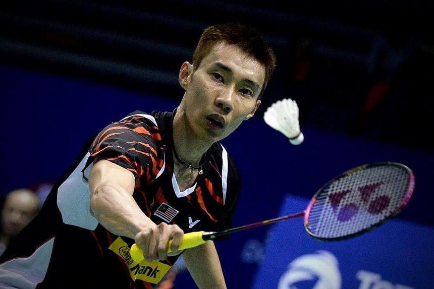 Lee Chong Wei of Malaysia returns to Dong Keun Lee of Korea during their men's singles match match of the 2015 Sudirman Cup world badminton championships in Dongguan, south China's Guangdong province on Sunday.-- PHOTO: AFP&nbsp;