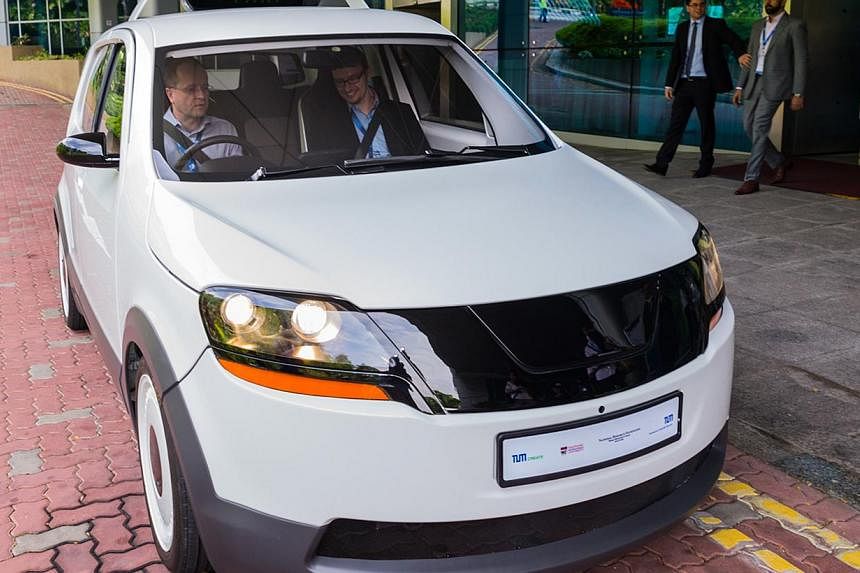 EVA, believed to be the world's first electric taxi designed in a collaboration between NTU and Germany’s Technische Universität München, is said to be able to go some 200km on a single 15-minute charge. -- PHOTO: TUM CREATE&nbsp;