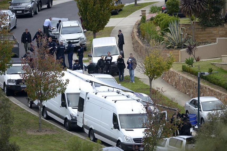 Australian police conducting a terror raid in Greenvale, Melbourne, on May 8, 2015. The country will allocate an extra A$450 million (S$476 million) to fight home-grown terrorism and bolster intelligence agencies to counter "evolving threats and tech
