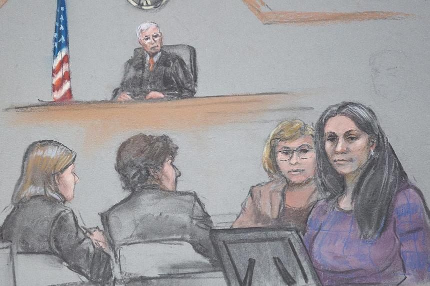 A sketch of the scene inside the courthouse during the trial of Dzhokhar Tsarnaev in Boston, Massachusetts, on May 4, 2015. The sketch shows Tsarnaev's cousin Raisat Suleimanova (right) testifying with an interpreter. -- PHOTO: EPA&nbsp;