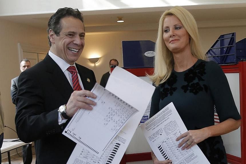 Democratic New York Governor Andrew Cuomo and his girlfriend Sandra Lee in a November 2014 file photo. The television chef girlfriend of New York Governor Andrew Cuomo on Tuesday became the latest American celebrity to announce she will undergo a dou