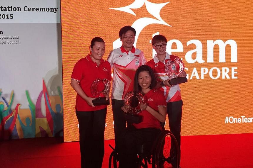 (From left) Wang Yuegu, Minister for Culture, Community and Youth Lawrence Wong, Yip Pin Xiu and Feng Tianwei. The athletes were inducted into the Sports Hall of Fame at the Team Singapore 28th SEA Games Flag Presentation Ceremony on Tuesday evening.