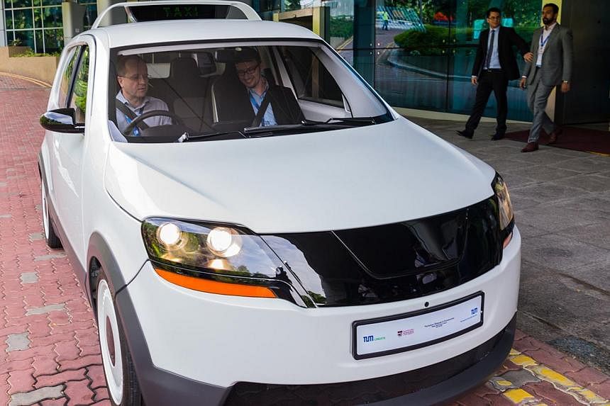 EVA, the taxi designed and built here by TUM Create - a collaboration between Nanyang Technological University and Germany's Technische Universitat Munchen - has a 200km range and a charging time of just 15 minutes. -- PHOTO: TUM CREATE