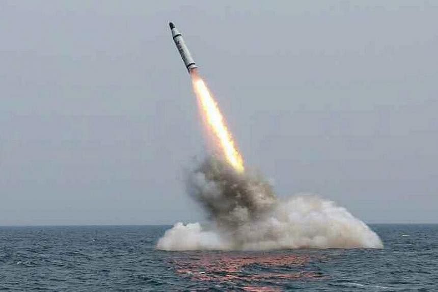 An image obtained by Yonhap News Agency show a ballistic missile believed to have been launched from underwater near Sinpo, on the northeast coast of North Korean on Saturday.-- PHOTO: EPA
