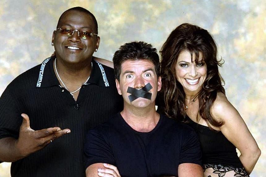 The original trio of American Idol judges from left to right Randy&nbsp;Jackson, Simon Cowell and Paula Abdul as seen in the TV show's heyday. -- PHOTO: FREMANTLE MEDIA
