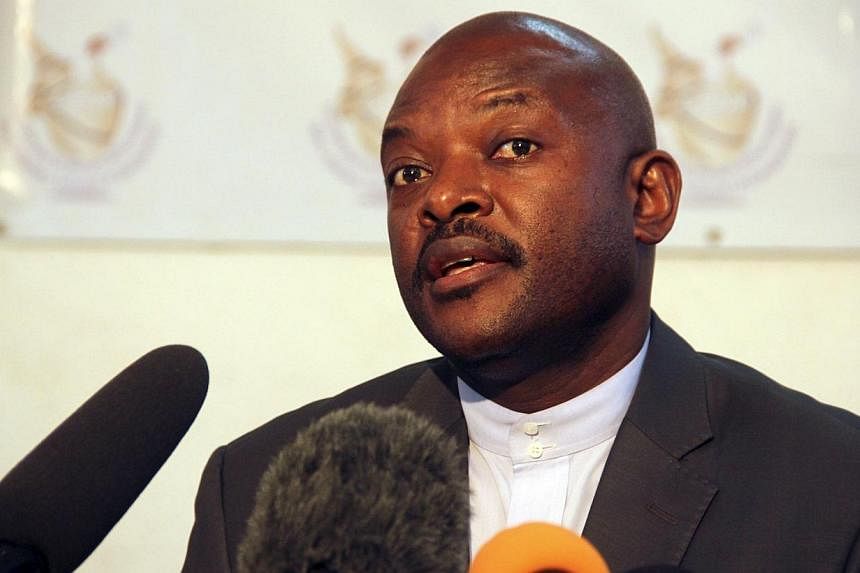 Burundian President Pierre Nkurunziza speaks to the media after he registered to run for a third five-year term in office, in the capital Bujumbura on&nbsp;May 8, 2015. Burundi's presidency said an attempted coup by a top general on Wednesday, May 13