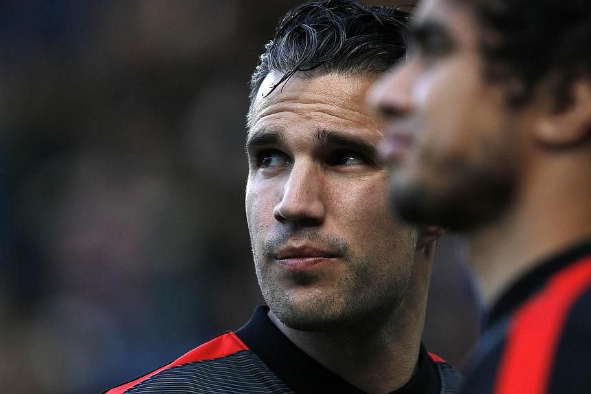 Manchester United's Dutch striker Robin van Persie warming up before the English Premier League football match between Chelsea and Manchester United on April 18, 2015. -- PHOTO: AFP&nbsp;