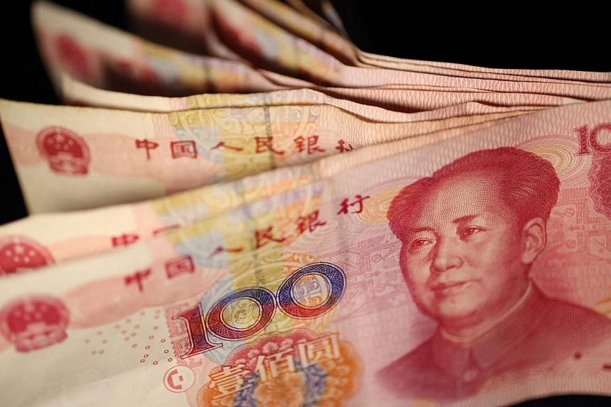 China is unlikely to engineer a competitive devaluation of the yuan as it seeks reserve currency status, according to one of the world's biggest bond funds Pacific Investment Management Co. (Pimco). -- PHOTO: EPA