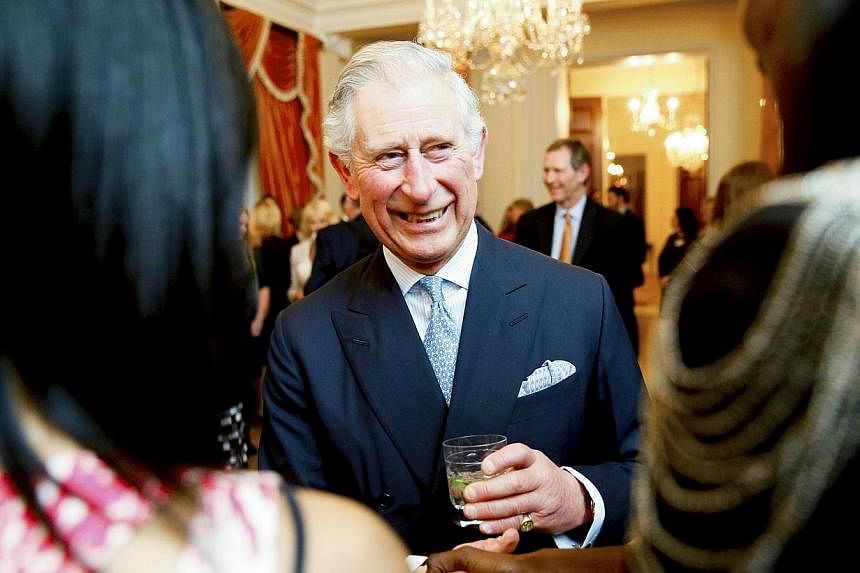 Britain's Prince Charles greets guests at a reception for him and his wife Camilla, Duchess of Cornwall, at the British Ambassador's residence in Washington on March 17, 2015. Prince Charles wrote to ministers on issues ranging from resources for Bri