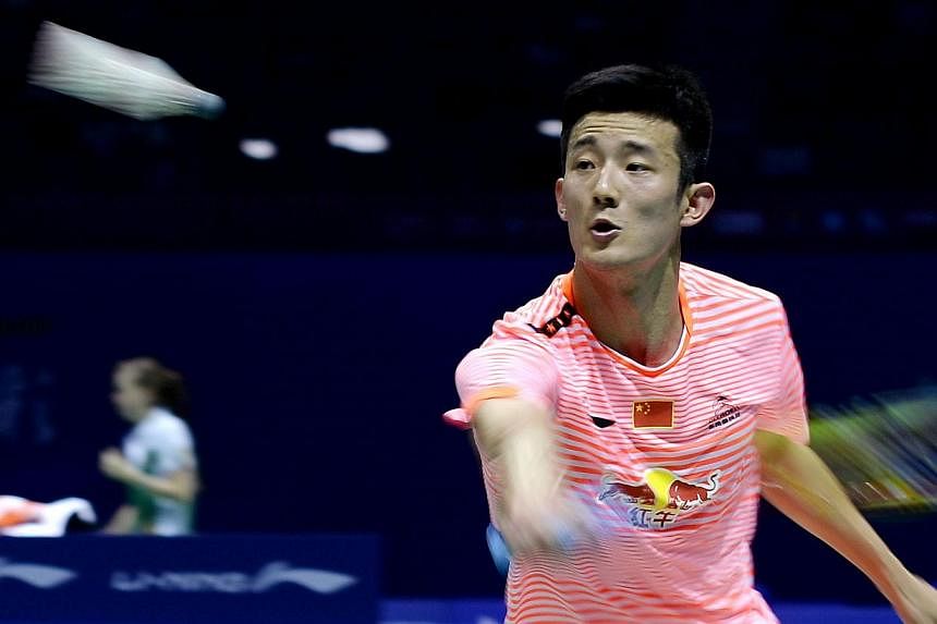 China's Chen Long returns the shuttlecock to Thailand's Boonsak Ponsana during their men's single match at the 2015 Sudirman Cup world badminton championships on May 12, 2015. -- PHOTO: AFP &nbsp;