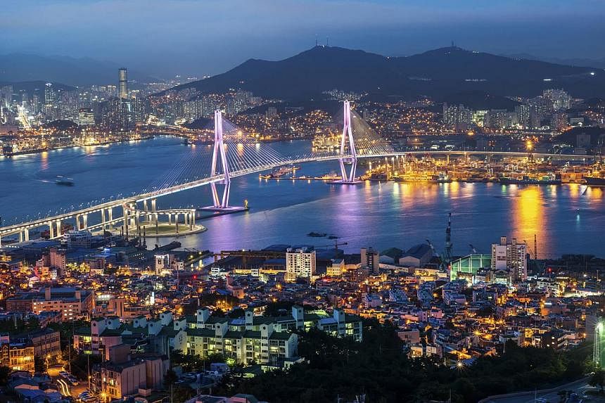 Night view of the Busan Port Bridge, so named as it is built over the city's maritime hub. Opened in May 2014, the 3.3km-long structure is the last of seven bridges built to link the southern coastal lands, improve traffic connectivity and offer a sp
