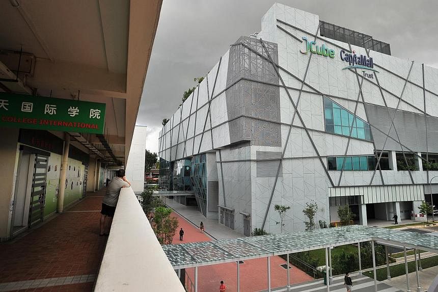 Owners of retail shops at housing blocks and shopping malls such as JCube (right) are jittery over potential competition from new commercial entities. -- PHOTO: ST FILE &nbsp;