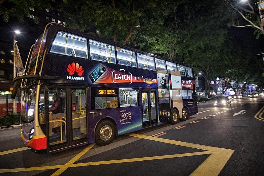 Singapore’s new illuminated double-decker bus features eLumiNEX, a breakthrough large-format backlit film technology. The bus was launched on Thursday on Service 190. -- PHOTO: SMRT MEDIA
