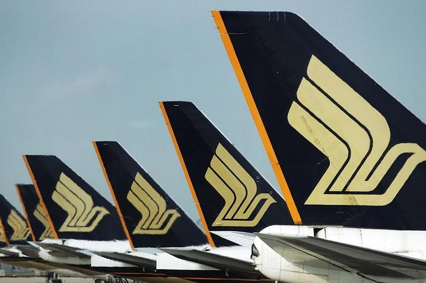 Singapore Airlines (SIA) has reported a 47 per cent jump in net profit to $39.6 million, for the three months to March 31, partly due to lower oil prices. --ST FILE PHOTO