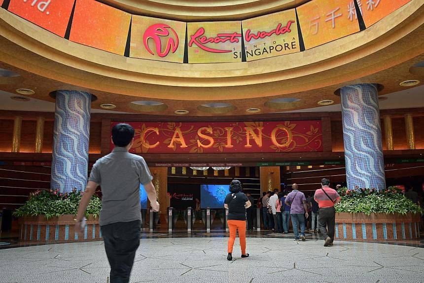 Genting Singapore's net profit to plunged 73 per cent from a year ago to $62.7 million for the first quarter, while revenues fell 23 per cent to $639.2 million, due to continued weakness in its premium player business. -- PHOTO: ST FILE