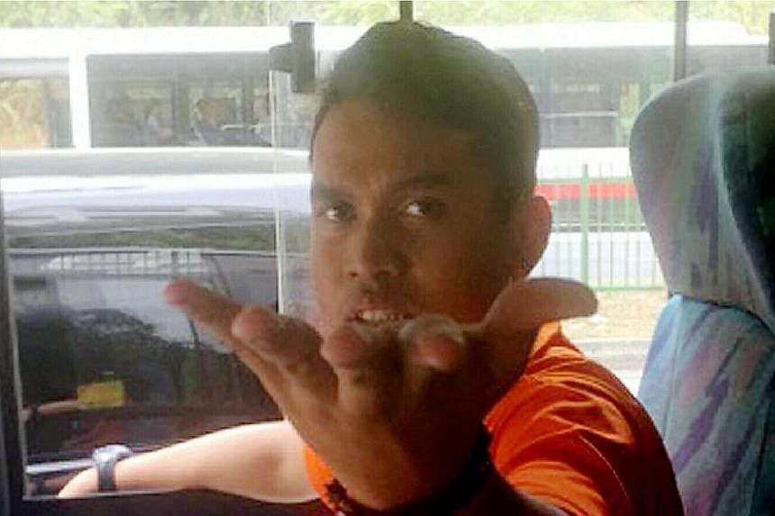 A Community Court heard that Muhammad Salahuddin Omar, who is deaf and cannot speak, was out on police bail when he committed the latest theft at Woodlands Industrial Park E8 on March 8. -- PHOTO: SHIN MIN DAILY NEWS