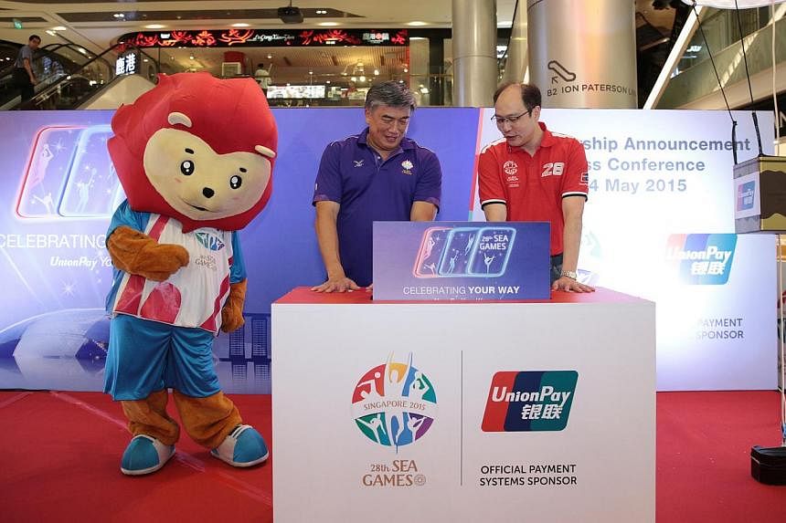 Singapore South East Asian Games Organising Committee (Singsoc) executive committee chairman Lim Teck Yin (left) together with UnionPay International Southeast Asia general manager Wenhui Yang at an event to announce UnionPay International's sponsors