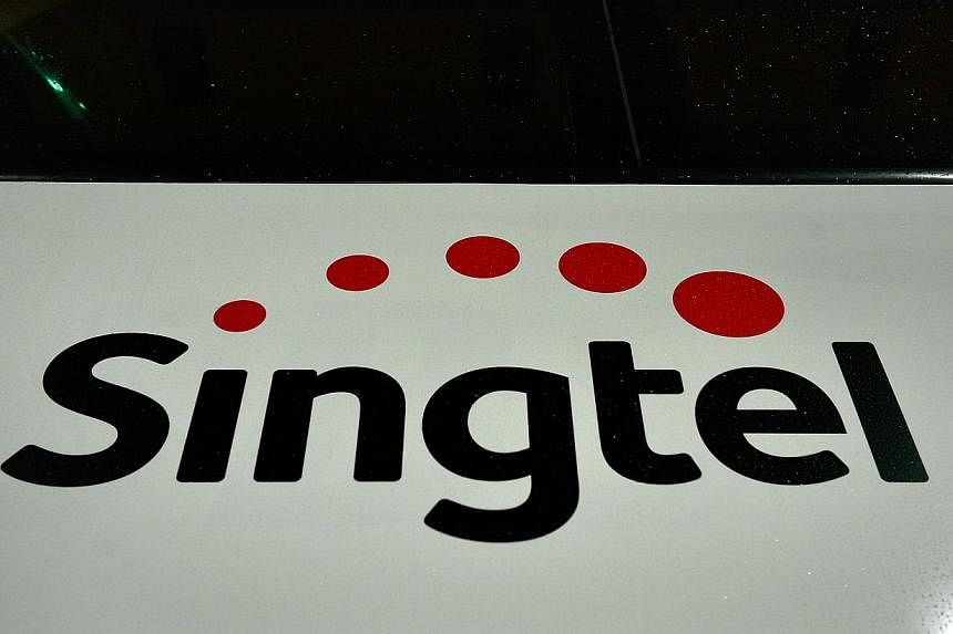 Mainboard-listed Singapore Telecommunications Ltd posted a 4.5 per cent rise in fourth-quarter net profit, helped by strong growth in customers and data services at its regional mobile associates.&nbsp;-- PHOTO: ST FILE&nbsp;