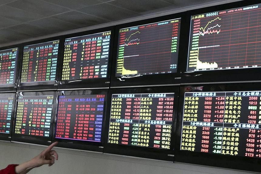 China stocks slumped on Friday morning after the securities regulator said the market has ample liquidity to handle more initial public offerings, with some interpreting it as a signal that IPO activity could be stepped up further. -- PHOTO: REUTERS
