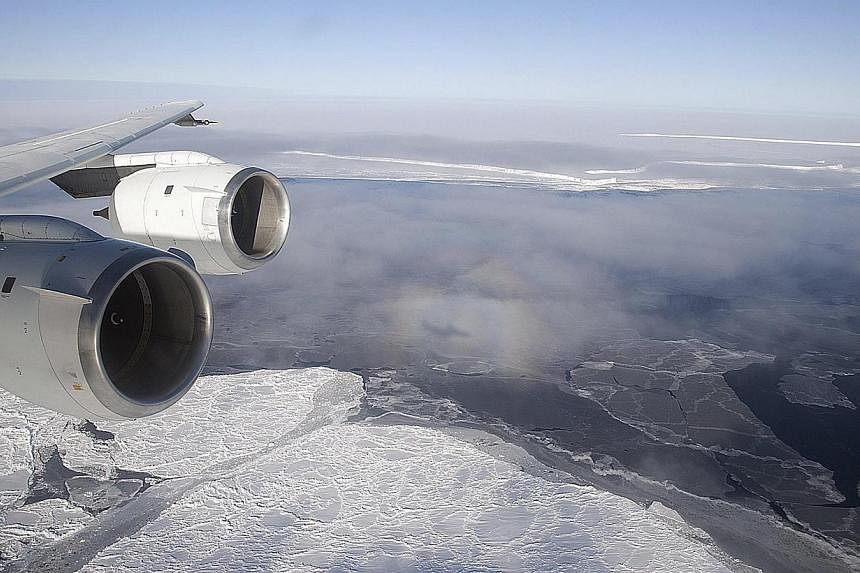 Nasa's DC-8 flies over the Brunt Ice Shelf in Antarctica October 26, 2010 in this handout photo provided by Nasa, on March 26, 2015. The last intact section of one of Antarctica's mammoth ice shelves is weakening fast and will likely disintegrate com