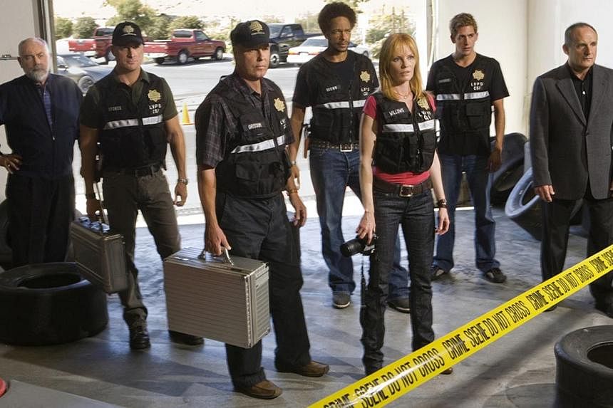 Popular police drama CSI: Crime Scene Investigation will end its 15-year run with a two-hour finale on Sept 27, 2015. -- PHOTO: AXN