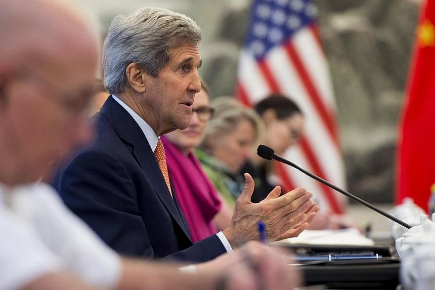 US Secretary of State John Kerry speaking during a meeting with Chinese Foreign Minister Wang Yi at the Ministry of Foreign Affairs in Beijing on May 16, 2015. -- PHOTO: REUTERS&nbsp;