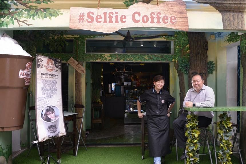 Operations manager Yves Zhuang (left) and Mr Eddy Chan (right), director of Avril Cafe, which opened Selfie Coffee in Haji Lane. -- ST PHOTO: DANIEL NEO