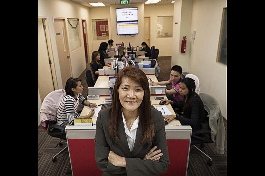 Ms Angel Ng oversees more than 50 employees, many of them ex-offenders, at Connect Centre. It trains former inmates to run its three call centres so they have a chance at holding down steady jobs and re-integrating into society.