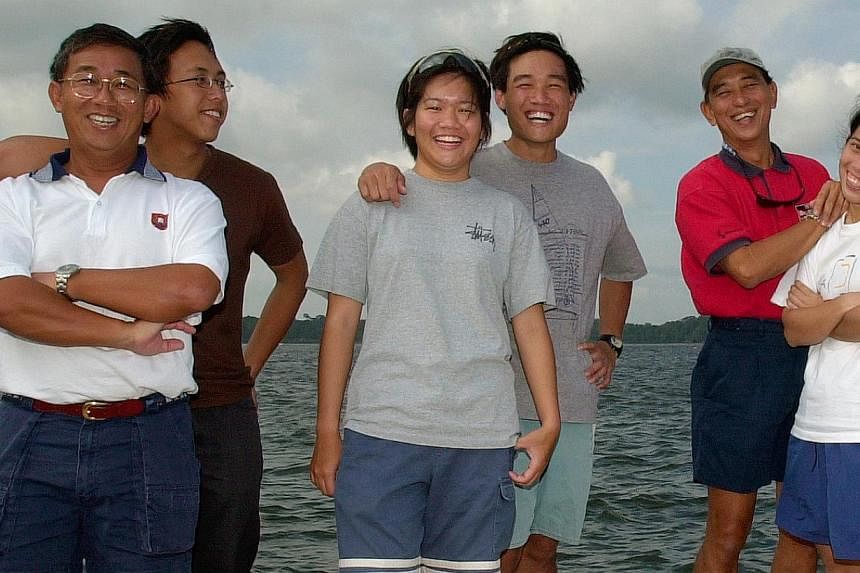 From left: Khor Chek Leong and son Teck Lin; Tan Wenqi and brother Wearn Haw, children of the late Yeok Keong; and Wong Ming Chee and daughter Maye-E have kept the love of sailing across generations. -- PHOTO: ST FILE